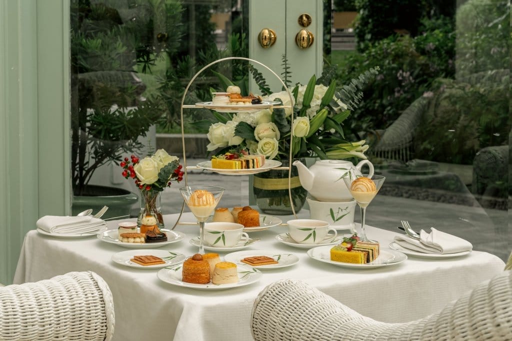 INDECA Living furniture setting featuring an Afternoon Tea Set for 4 from The Authors' Lounge at Mandarin Oriental Bangkok.